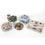 a Middle Eastern, ceramic inkwell and four antique French ceramic inkwells, each with a polychrome d