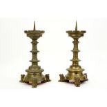 pair of antique gothic revival brass candlesticks