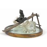 1920/30's inkstand in brass, glass and silverplated metal decorated with a child on a slide