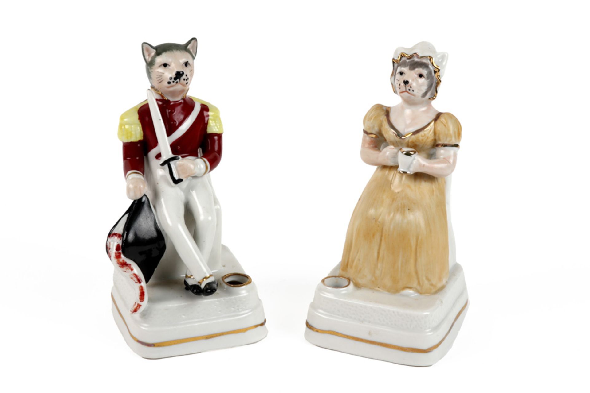 pair of German porcelain Art Deco inkwells each with a figure with a cat's head