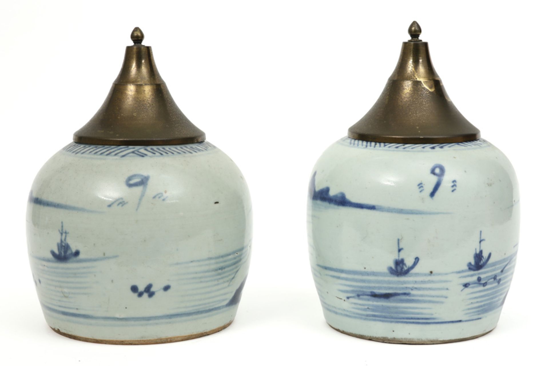 pair of antique Chinese jars in porcelain with a blue-white decor - each with an antique brass lid - Image 2 of 4
