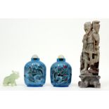 four Chinese items with two glass flasks, a soapstone figure and a jade elephant