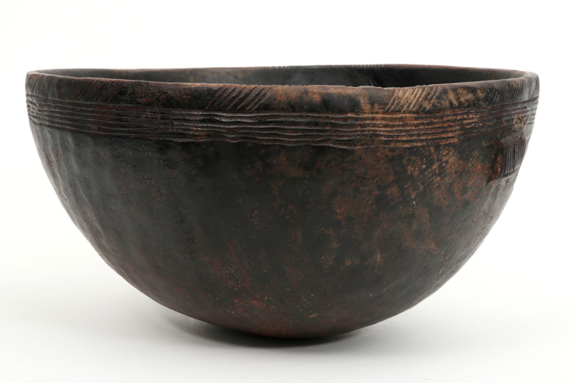 authentic Nigerain Nupe bowl in wood with typical carved ornamentation