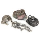 four inkstands in (silverplated) metal, one with a horse head and shoe