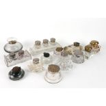 thirteen antique and old inkwells in clear glass and metal
