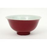 Chinese bowl in marked porcelain with a pinkish glaze on the outside and with on the inside a celado