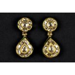 pair of antique North Indian "Kundan" earrings in partially lacquered yellow gold and set with typic