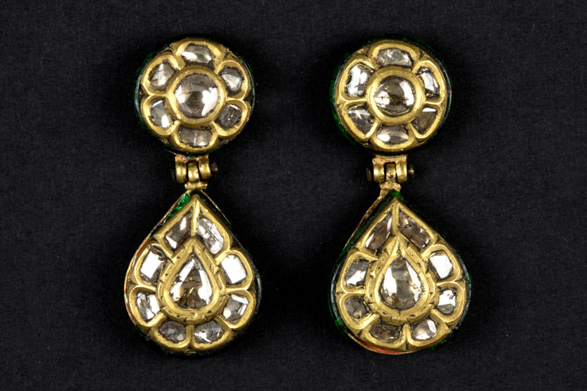 pair of antique North Indian "Kundan" earrings in partially lacquered yellow gold and set with typic