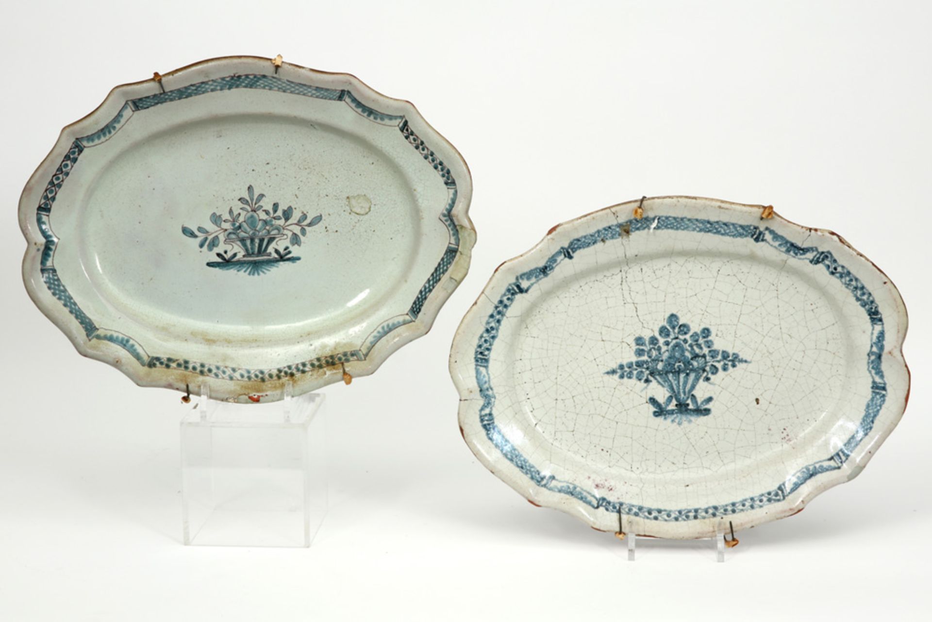two antique French oval meat dishes in ceramic with blue-white decor