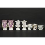 eight antique vases in porcelain from Brussels