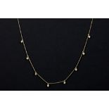 necklace in yellow gold (18 carat) with eight pendants with ca 0,40 carat of very high quality brill