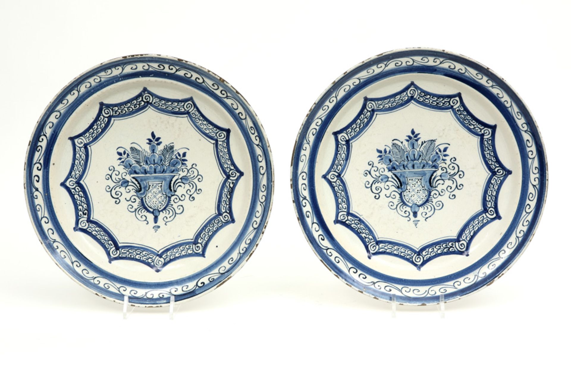 pair of 18th Cent., presumably French, dishes in ceramic with a blue-white decor with flower basket