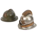 two quite rare antique metal inkwells shaped as a helmet - one is marked "World Exhibition Antwerp 1