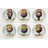 series of six plates in marked porcelain, each with a different polychrome decor with an air balloon