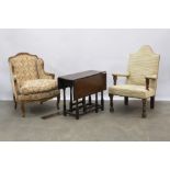 two oak armchairs, an oak Sutherland table and two small oak occasional tables