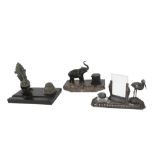 three Art Deco inkstands each with an animal