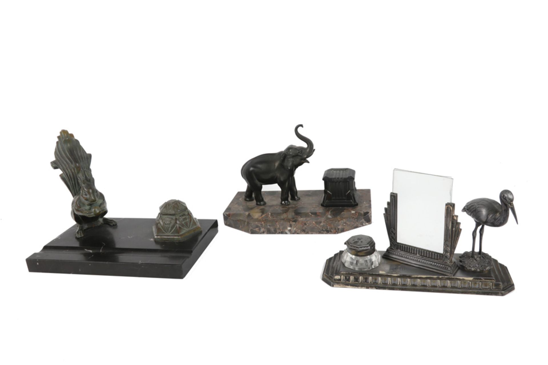 three Art Deco inkstands each with an animal