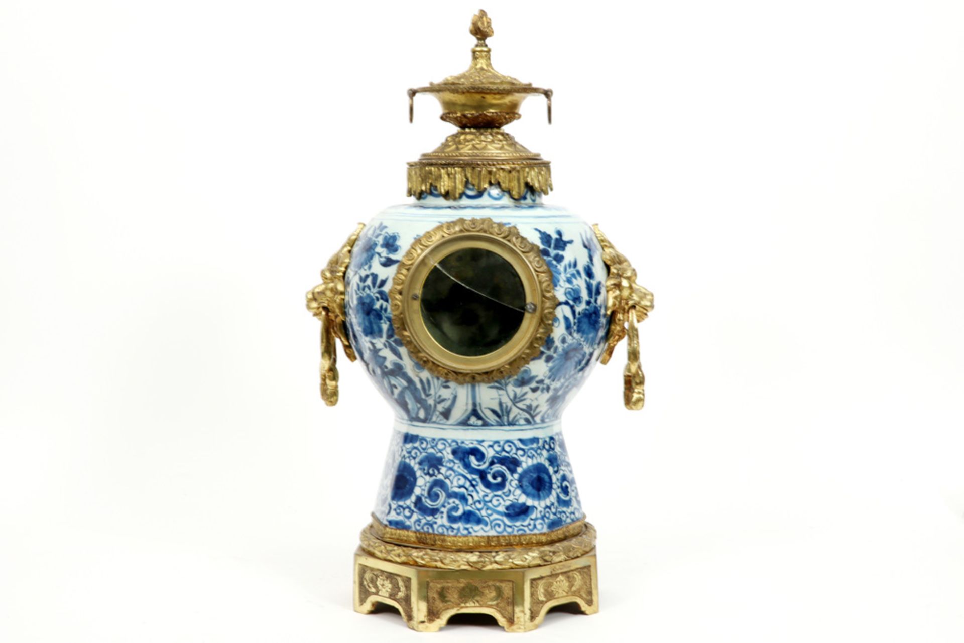 19th Cent. clock with an 18th Cent. Delft ceramic vase with blue-white decor and with mountings in g - Image 3 of 3