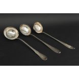 three antique ladles in marked silver