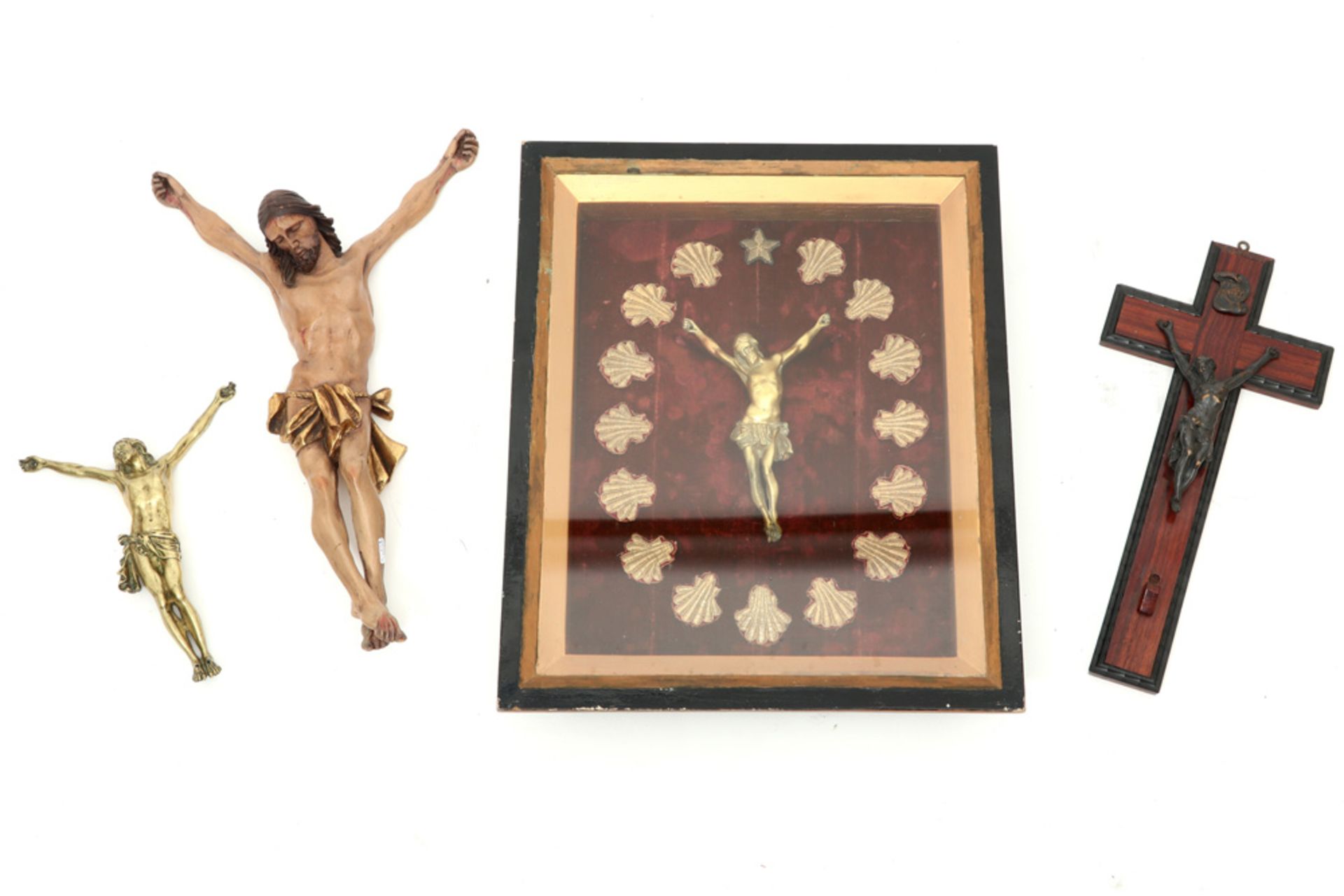 three antique Christ corps (one framed) and a 20th Cent. one