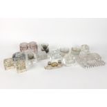 fourteen antique and old inkwells in clear glass