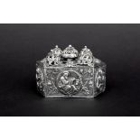 small antique silver box with lid with five domes and with corpus with the representation of saints