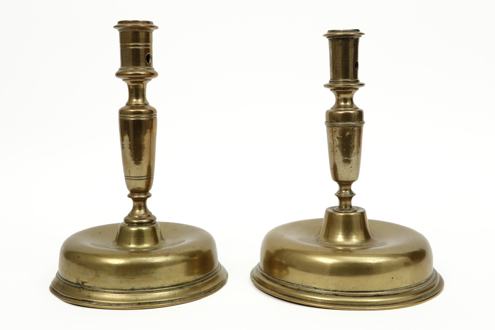 two 17th Cent. Spanish brass candlesticks on a round base