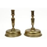 two 17th Cent. Spanish brass candlesticks on a round base