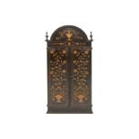 antique altar cabinet in oak with inlaid floral motives and with two doors, which hide a shrine with