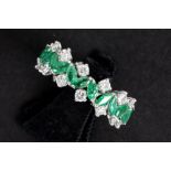 ring in white gold (18 carat) with ca 3 carats of emeralds and ca 1,20 carat of high quality brillia