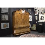 superb mid 18th Cent. cabinet in burr of walnut with double curved base with four drawers and with t