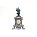 small 19th Cent. clock in porcelain from Paris with a "Paris" marked work