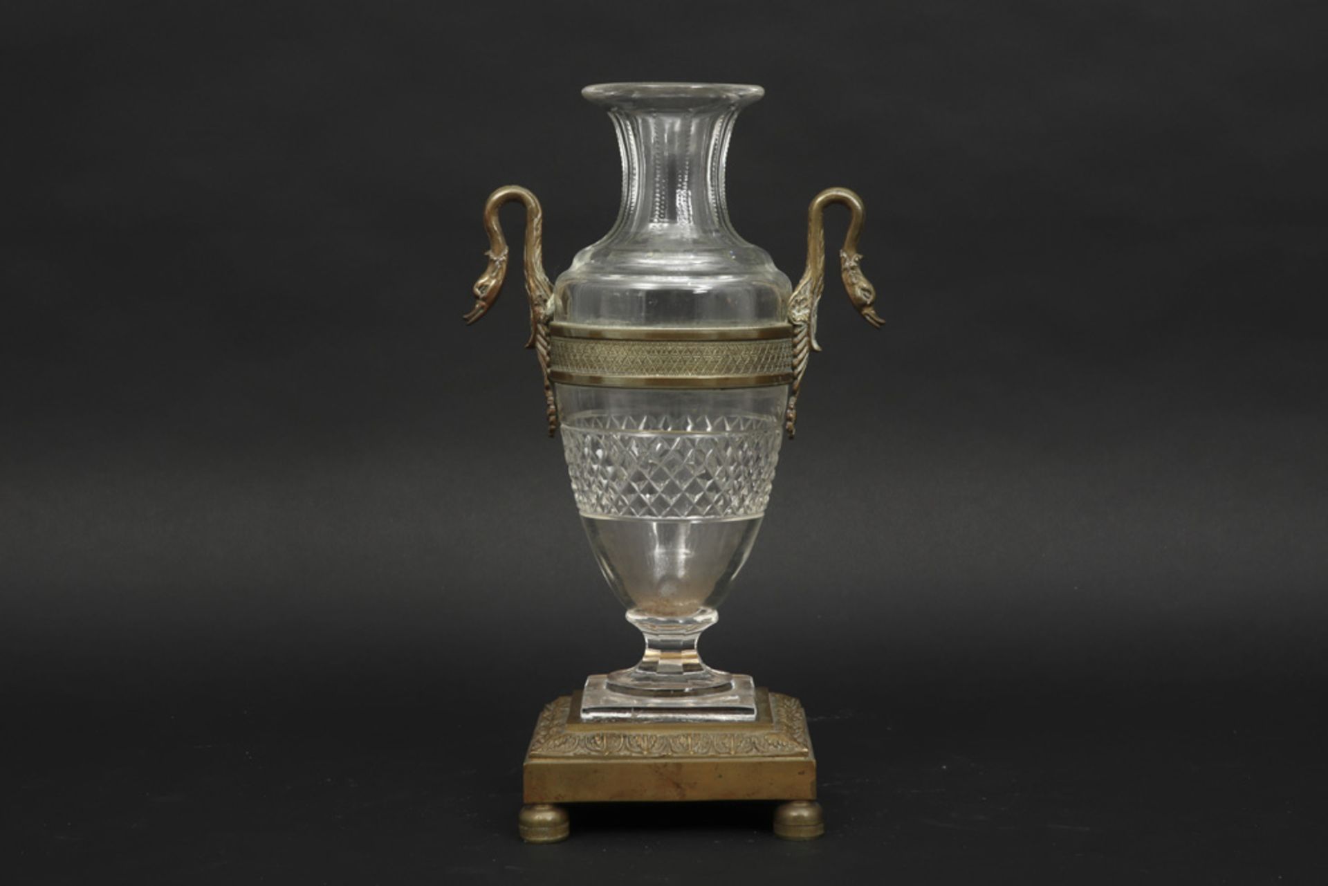 antique vase in clear crystal-glass with Empire style mountings in gilded bronze