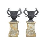 pair of 19th Cent. lead gardenvases, each on a stone base