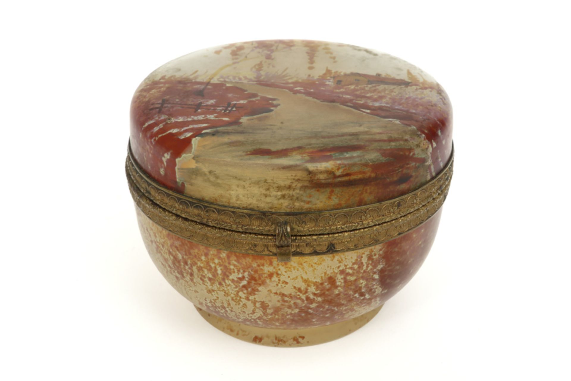lidded Art Nouveau box in glass with a landscape decor in brownish colors