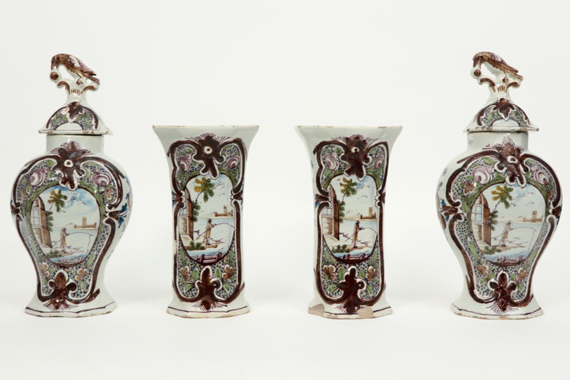 antique 4pc garniture in ceramic from Delft with a polychrome decor
