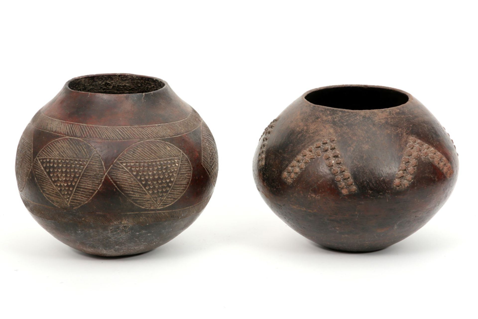 two South African beer jugs from the Zulu in earthenware