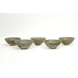 series of five Chinese Song period bowls in earthenware with grey celadon glaze prov : the shipwreck