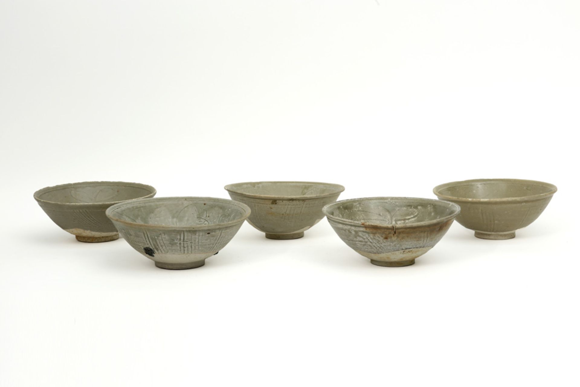 series of five Chinese Song period bowls in earthenware with grey celadon glaze prov : the shipwreck
