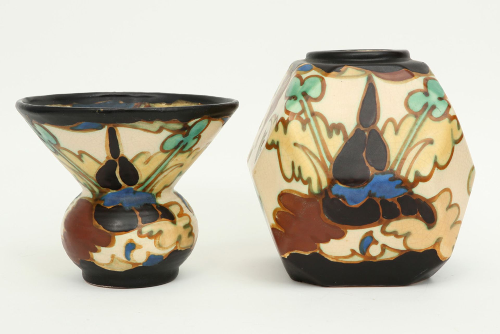 two Belgian Art Deco vases in marked ceramic with a polychrome vegetal decor