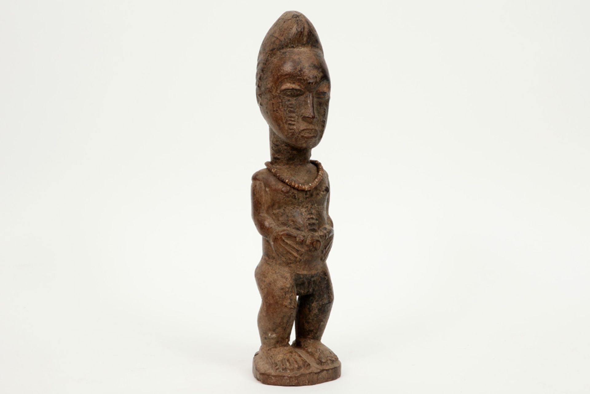 authentic Ivory Coast Baule ancestral sculpture in wood with fine carvings