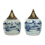 pair of antique Chinese jars in porcelain with a blue-white decor - each with an antique brass lid