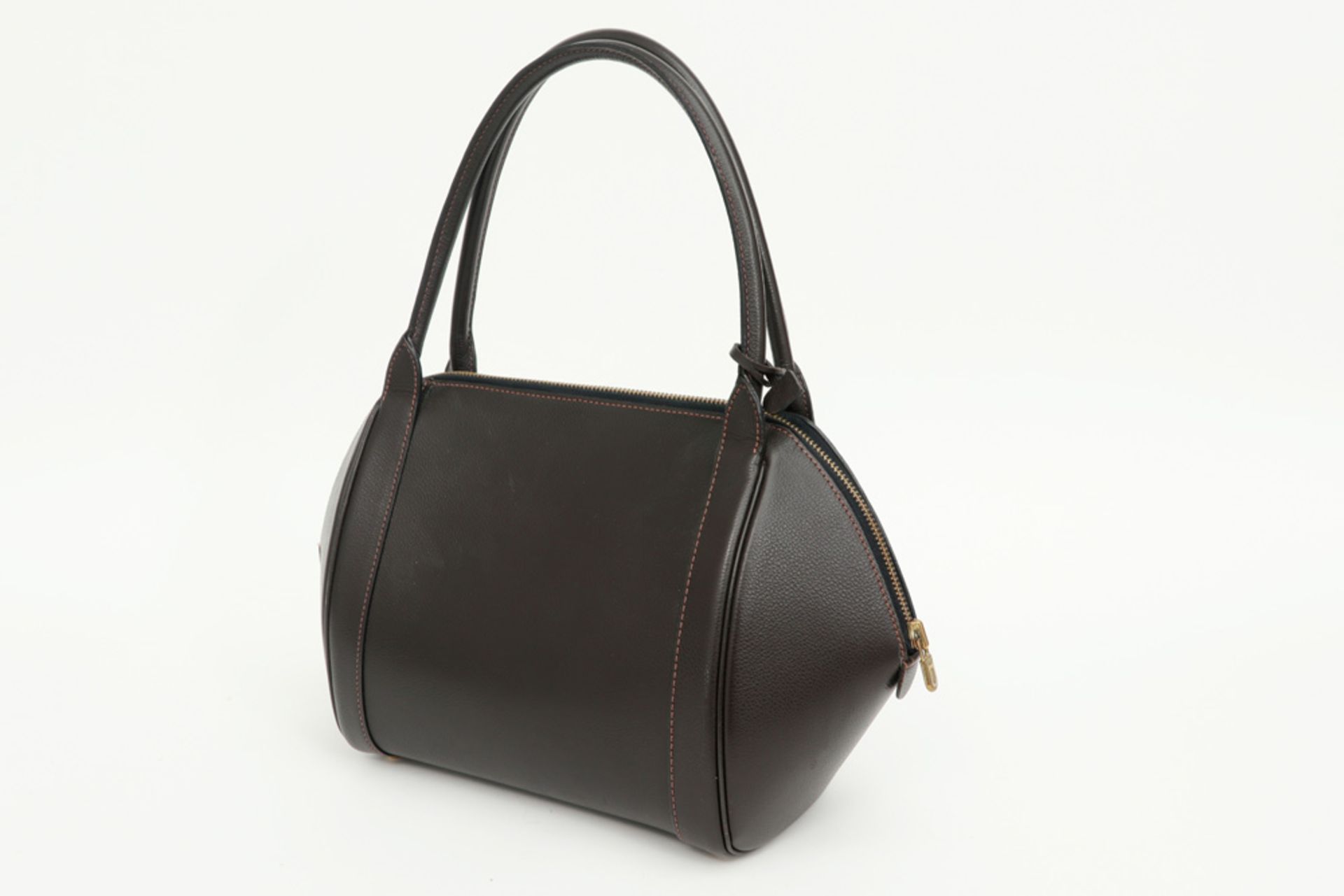 Delvaux marked handbag in brown leather