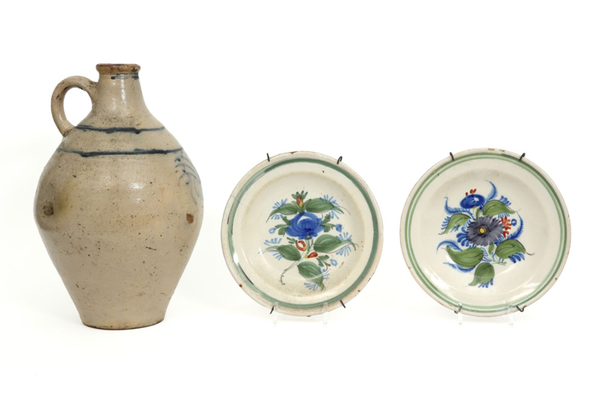 3 pieces of antique earthenware : two plates and a pitcher