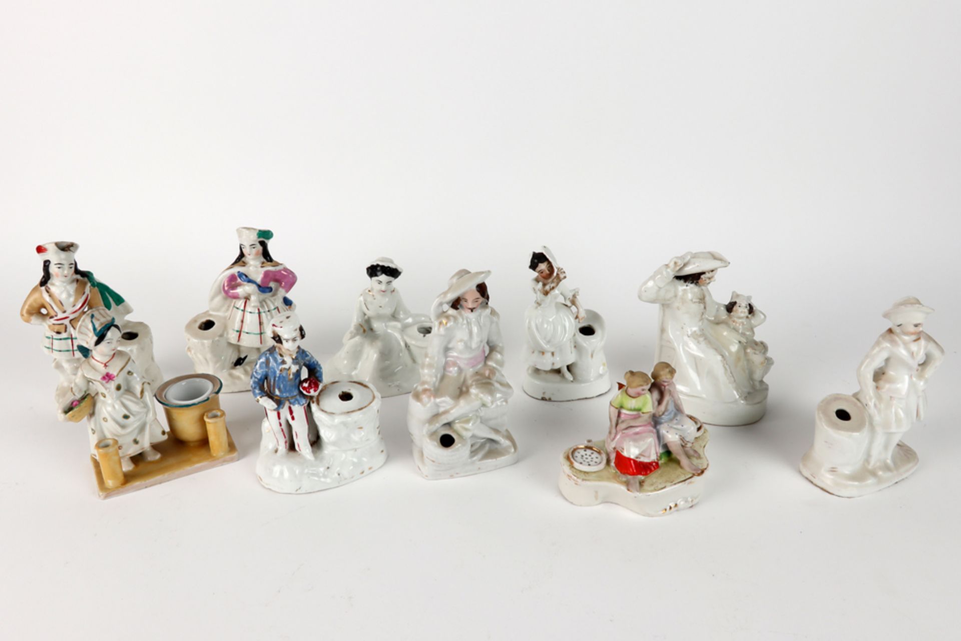ten antique inkwells in porcelain, each with a figure - Image 2 of 2