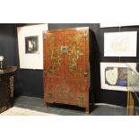 antique Chinese Qing period cabinet from Bejing in lacquered wood with a polychrome decor with 'fool