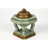 antique Chinese four-legged inkwell in porcelain with a gilded metal European mounting