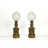 pair of antique brass paraffin lamps