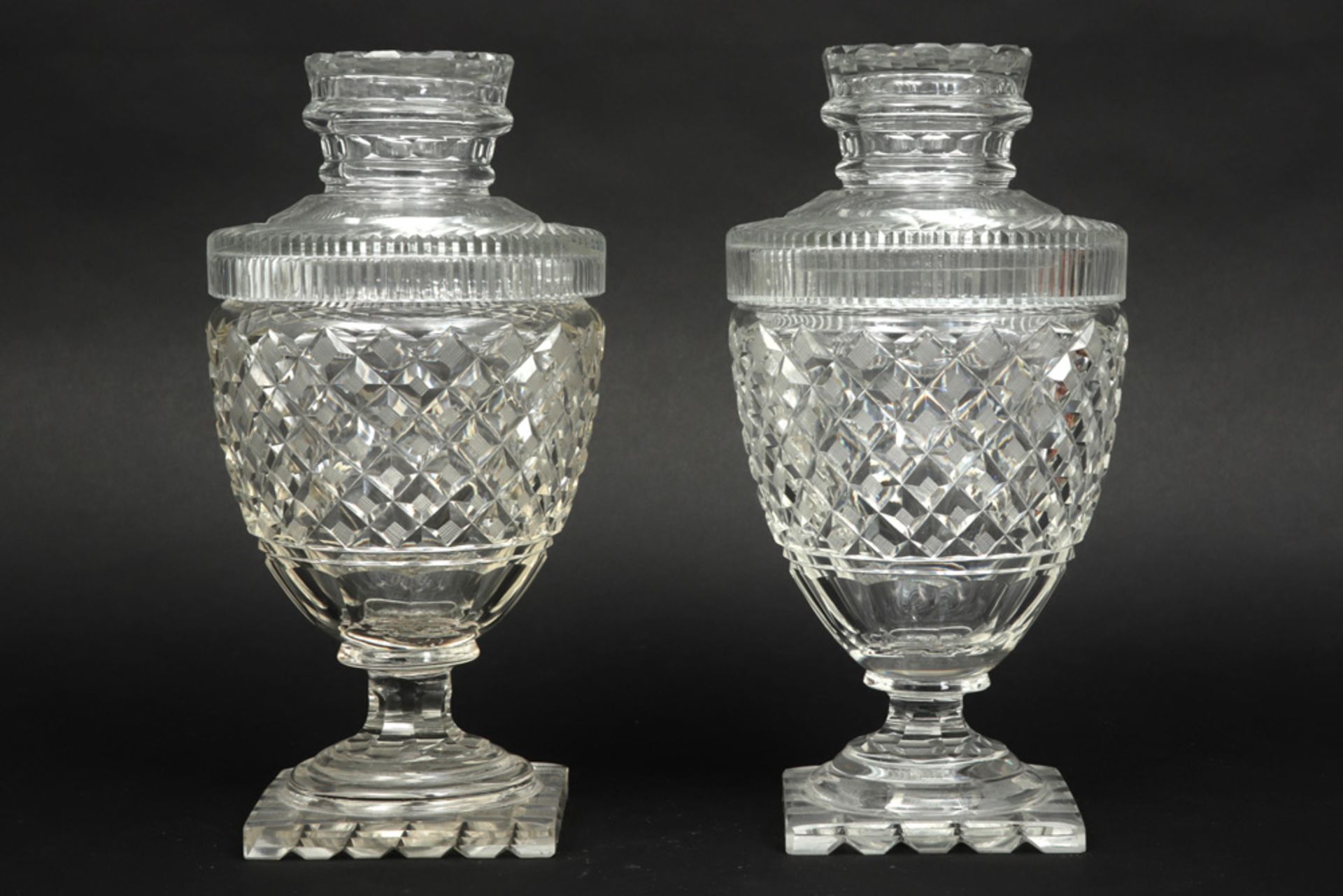 pair of antique lidded sweet's jars in clear crystal glass