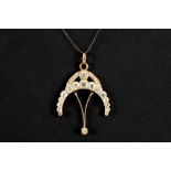 antique pendant with a quite special design in pink gold (18 carat) with ca 2 carat of old brilliant